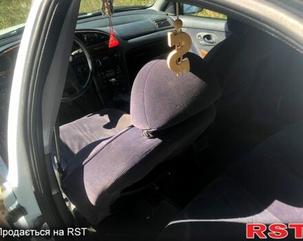 Білий Форд Мондео, об'ємом двигуна 2.5 л та пробігом 223 тис. км за 1800 $, фото 4 на Automoto.ua