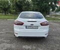 Білий Форд Мондео, об'ємом двигуна 2 л та пробігом 248 тис. км за 8000 $, фото 11 на Automoto.ua
