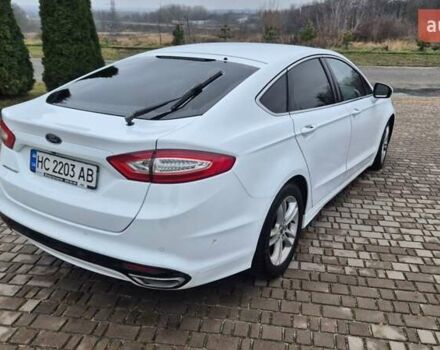 Белый Форд Мондео, объемом двигателя 2 л и пробегом 297 тыс. км за 13900 $, фото 24 на Automoto.ua