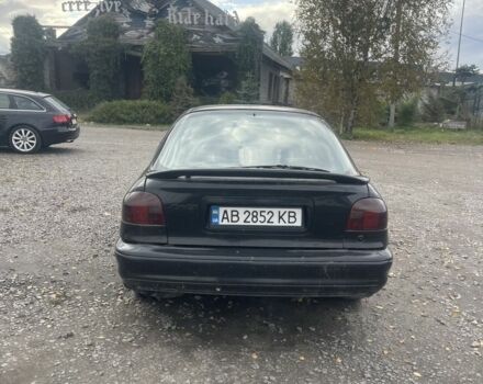 Черный Форд Мондео, объемом двигателя 2 л и пробегом 210 тыс. км за 1300 $, фото 2 на Automoto.ua