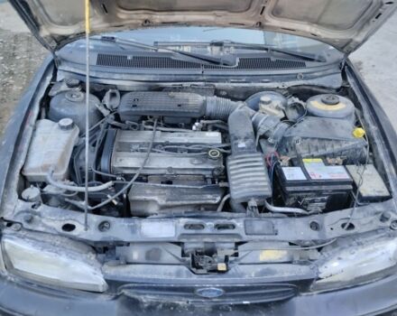 Черный Форд Мондео, объемом двигателя 2 л и пробегом 222 тыс. км за 500 $, фото 3 на Automoto.ua