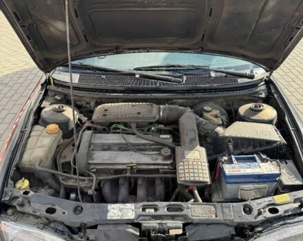 Черный Форд Мондео, объемом двигателя 1.8 л и пробегом 250 тыс. км за 1400 $, фото 7 на Automoto.ua