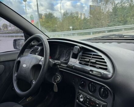 Черный Форд Мондео, объемом двигателя 1.8 л и пробегом 250 тыс. км за 1400 $, фото 11 на Automoto.ua