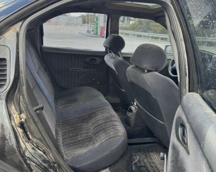 Черный Форд Мондео, объемом двигателя 1.8 л и пробегом 250 тыс. км за 1400 $, фото 13 на Automoto.ua