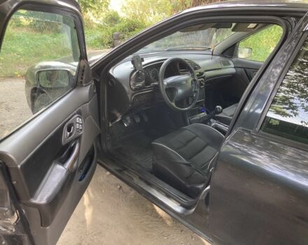 Черный Форд Мондео, объемом двигателя 2 л и пробегом 235 тыс. км за 2300 $, фото 4 на Automoto.ua