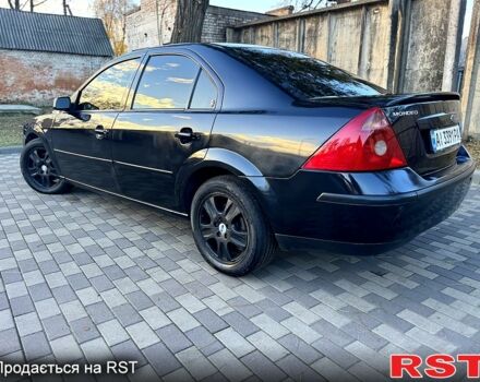 Черный Форд Мондео, объемом двигателя 2.5 л и пробегом 265 тыс. км за 3800 $, фото 5 на Automoto.ua