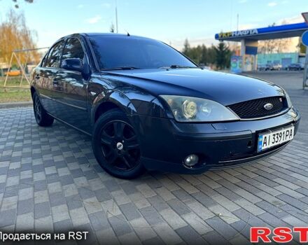 Черный Форд Мондео, объемом двигателя 2.5 л и пробегом 265 тыс. км за 3800 $, фото 1 на Automoto.ua