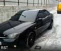 Чорний Форд Мондео, об'ємом двигуна 2.5 л та пробігом 270 тис. км за 3999 $, фото 1 на Automoto.ua