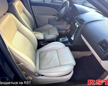 Черный Форд Мондео, объемом двигателя 2.5 л и пробегом 265 тыс. км за 3800 $, фото 9 на Automoto.ua