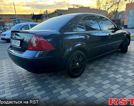 Черный Форд Мондео, объемом двигателя 2.5 л и пробегом 265 тыс. км за 3800 $, фото 4 на Automoto.ua