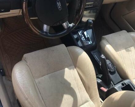 Черный Форд Мондео, объемом двигателя 2.5 л и пробегом 230 тыс. км за 4750 $, фото 1 на Automoto.ua