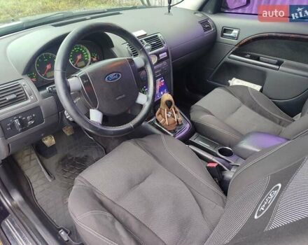 Черный Форд Мондео, объемом двигателя 2 л и пробегом 225 тыс. км за 5900 $, фото 7 на Automoto.ua