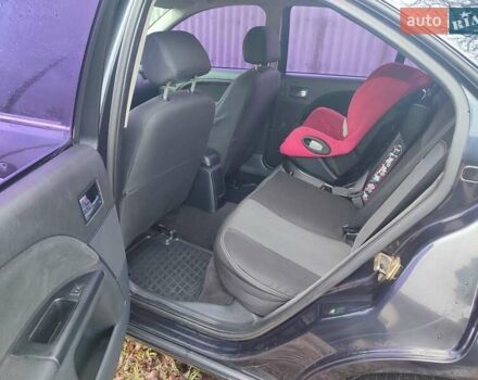 Черный Форд Мондео, объемом двигателя 2 л и пробегом 225 тыс. км за 5900 $, фото 8 на Automoto.ua