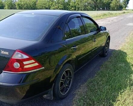 Форд Мондео 2004 в Кривом Роге на Automoto.ua Черный Форд Мондео, объемом двигателя 2 л и пробегом 320 тыс. км за 4200 $, фото 7 на Automoto.ua