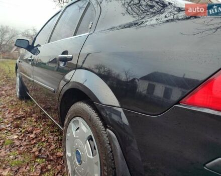 Черный Форд Мондео, объемом двигателя 2 л и пробегом 225 тыс. км за 5900 $, фото 6 на Automoto.ua