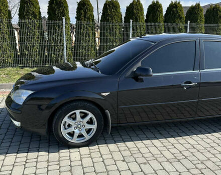 Форд Мондео 2004 в Львове на Automoto.ua Черный Форд Мондео, объемом двигателя 2 л и пробегом 269 тыс. км за 3999 $, фото 28 на Automoto.ua