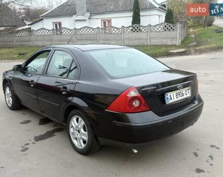 Черный Форд Мондео, объемом двигателя 1.8 л и пробегом 200 тыс. км за 2950 $, фото 4 на Automoto.ua