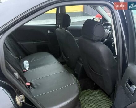 Черный Форд Мондео, объемом двигателя 1.8 л и пробегом 200 тыс. км за 2950 $, фото 10 на Automoto.ua