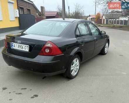 Черный Форд Мондео, объемом двигателя 1.8 л и пробегом 200 тыс. км за 2950 $, фото 3 на Automoto.ua