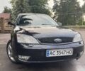 Черный Форд Мондео, объемом двигателя 2 л и пробегом 252 тыс. км за 3750 $, фото 1 на Automoto.ua