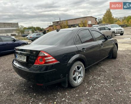 Черный Форд Мондео, объемом двигателя 1.8 л и пробегом 313 тыс. км за 5200 $, фото 9 на Automoto.ua