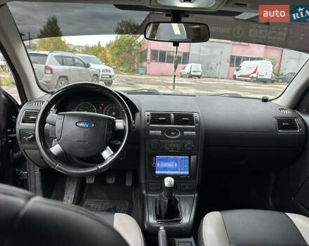 Черный Форд Мондео, объемом двигателя 1.8 л и пробегом 313 тыс. км за 5200 $, фото 28 на Automoto.ua