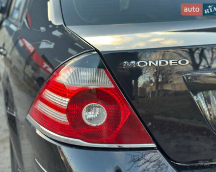 Черный Форд Мондео, объемом двигателя 2 л и пробегом 260 тыс. км за 4799 $, фото 31 на Automoto.ua