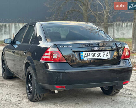 Черный Форд Мондео, объемом двигателя 2 л и пробегом 260 тыс. км за 4799 $, фото 7 на Automoto.ua