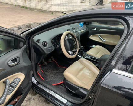 Черный Форд Мондео, объемом двигателя 2 л и пробегом 209 тыс. км за 5900 $, фото 4 на Automoto.ua