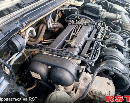 Черный Форд Мондео, объемом двигателя 1.6 л и пробегом 166 тыс. км за 6500 $, фото 7 на Automoto.ua