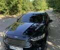 Чорний Форд Мондео, об'ємом двигуна 2 л та пробігом 105 тис. км за 13144 $, фото 1 на Automoto.ua
