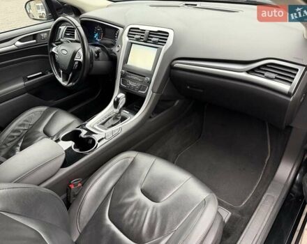 Черный Форд Мондео, объемом двигателя 2 л и пробегом 170 тыс. км за 8700 $, фото 42 на Automoto.ua