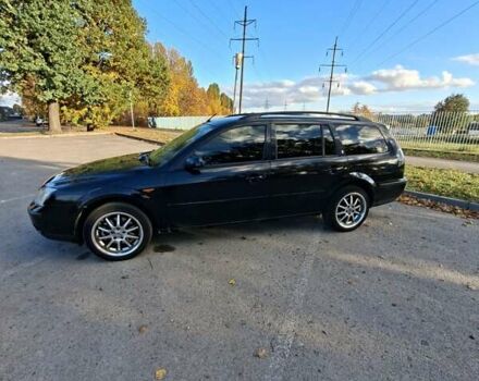 Черный Форд Мондео, объемом двигателя 2 л и пробегом 208 тыс. км за 4500 $, фото 8 на Automoto.ua