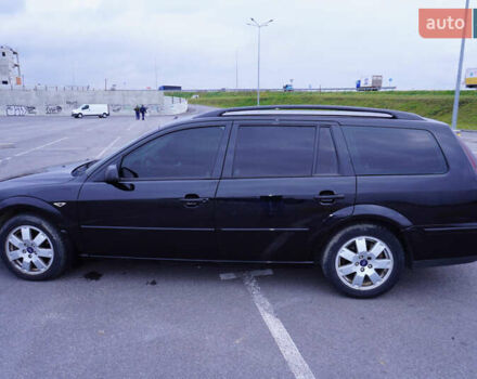 Черный Форд Мондео, объемом двигателя 2 л и пробегом 294 тыс. км за 3899 $, фото 13 на Automoto.ua