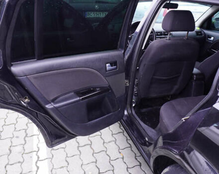 Черный Форд Мондео, объемом двигателя 2 л и пробегом 294 тыс. км за 3899 $, фото 19 на Automoto.ua