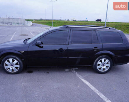 Черный Форд Мондео, объемом двигателя 2 л и пробегом 294 тыс. км за 3899 $, фото 14 на Automoto.ua