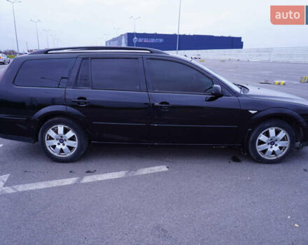 Черный Форд Мондео, объемом двигателя 2 л и пробегом 294 тыс. км за 3899 $, фото 12 на Automoto.ua