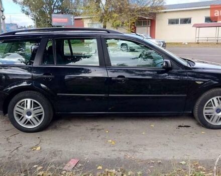 Черный Форд Мондео, объемом двигателя 2 л и пробегом 285 тыс. км за 4600 $, фото 5 на Automoto.ua