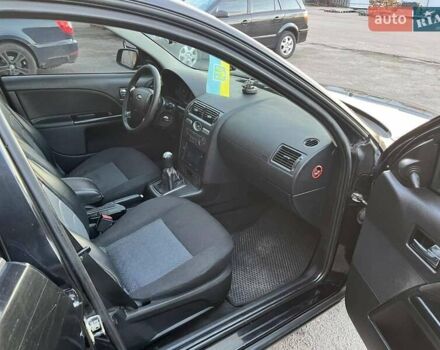 Черный Форд Мондео, объемом двигателя 1.8 л и пробегом 316 тыс. км за 3500 $, фото 7 на Automoto.ua