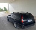 Чорний Форд Мондео, об'ємом двигуна 2 л та пробігом 332 тис. км за 3497 $, фото 2 на Automoto.ua