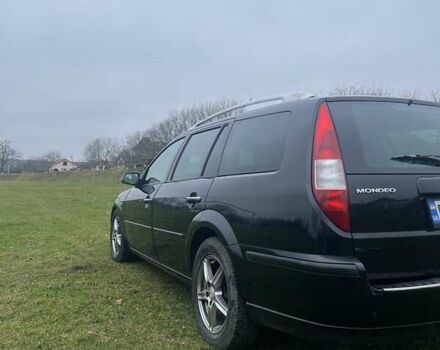 Черный Форд Мондео, объемом двигателя 2 л и пробегом 250 тыс. км за 3135 $, фото 4 на Automoto.ua