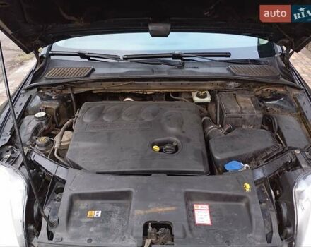 Черный Форд Мондео, объемом двигателя 2 л и пробегом 217 тыс. км за 6700 $, фото 4 на Automoto.ua