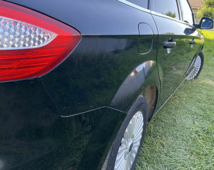 Черный Форд Мондео, объемом двигателя 2 л и пробегом 214 тыс. км за 7999 $, фото 5 на Automoto.ua