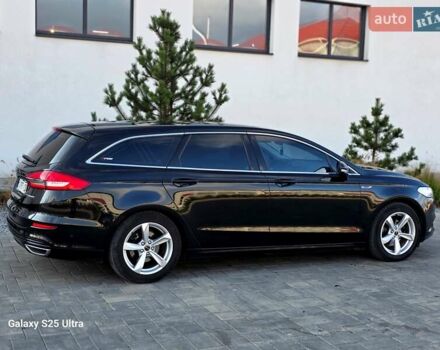 Черный Форд Мондео, объемом двигателя 2 л и пробегом 263 тыс. км за 14499 $, фото 39 на Automoto.ua