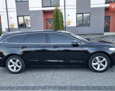 Черный Форд Мондео, объемом двигателя 2 л и пробегом 228 тыс. км за 13800 $, фото 7 на Automoto.ua