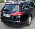 Чорний Форд Мондео, об'ємом двигуна 2 л та пробігом 260 тис. км за 16800 $, фото 5 на Automoto.ua