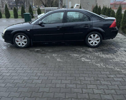 Черный Форд Мондео, объемом двигателя 2 л и пробегом 295 тыс. км за 3900 $, фото 1 на Automoto.ua