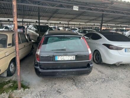 Черный Форд Мондео, объемом двигателя 2 л и пробегом 453 тыс. км за 1599 $, фото 1 на Automoto.ua