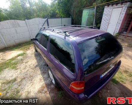 Фиолетовый Форд Мондео, объемом двигателя 2 л и пробегом 232 тыс. км за 1900 $, фото 3 на Automoto.ua