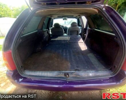 Фиолетовый Форд Мондео, объемом двигателя 2 л и пробегом 232 тыс. км за 1900 $, фото 5 на Automoto.ua